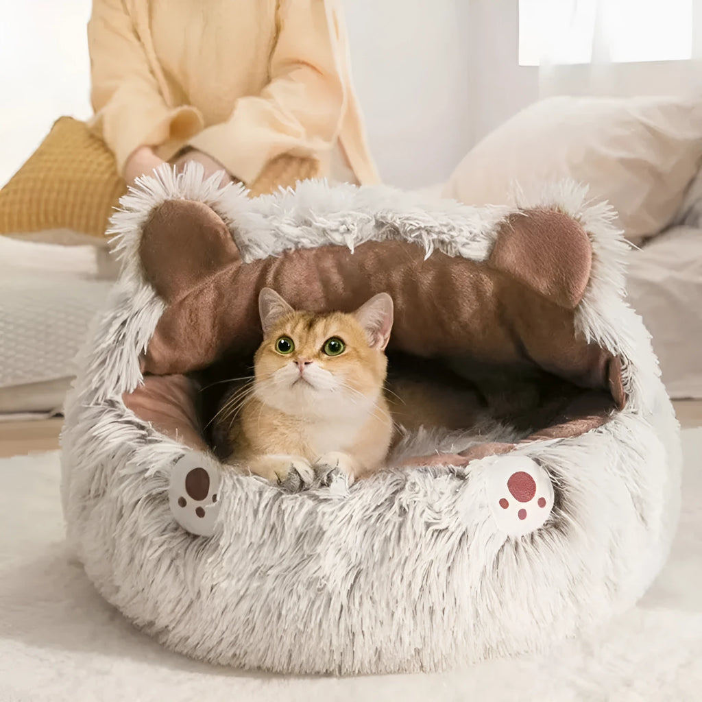 Round plush cat bed in brown or grey with non-slip rubber sole, available in 40cm, 50cm, 65cm and 100cm sizes