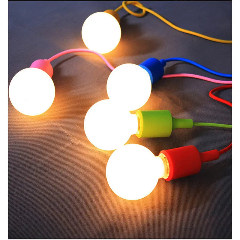 Silicone pendant light holder with black cord and E27 socket next to white and blue colour variants.