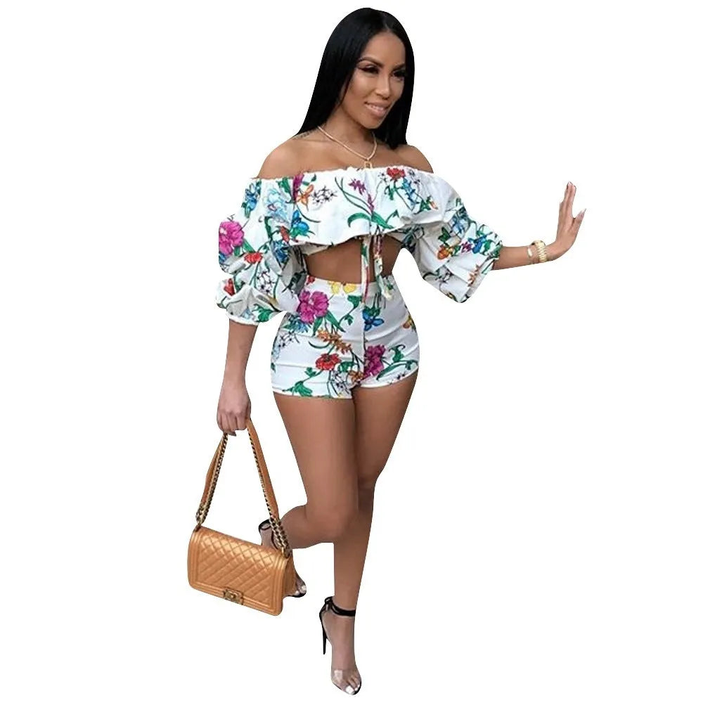 Women's multicolour digital print pyjama set with a short top featuring fluffy long sleeves and matching shorts.