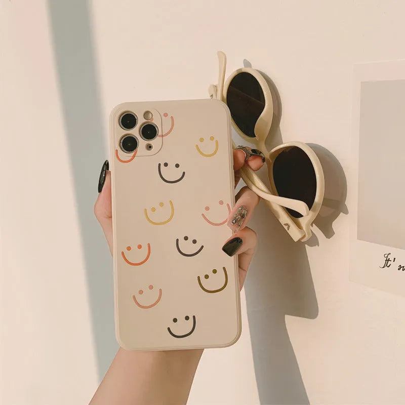 Silicone phone case with smiley design for Apple iPhone models in TPU material