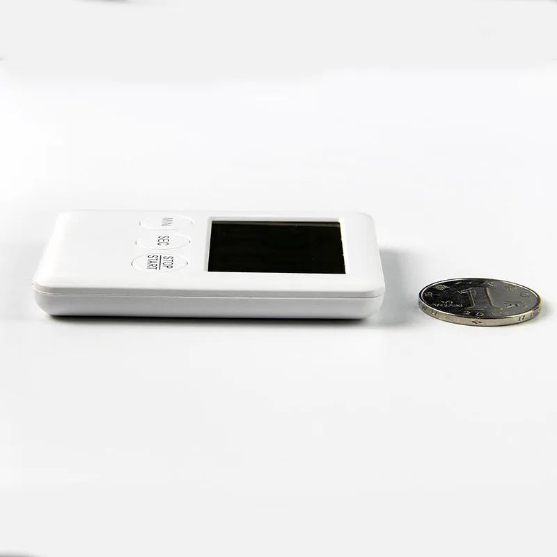 Magnetic kitchen timer with countdown display in black or white colour options