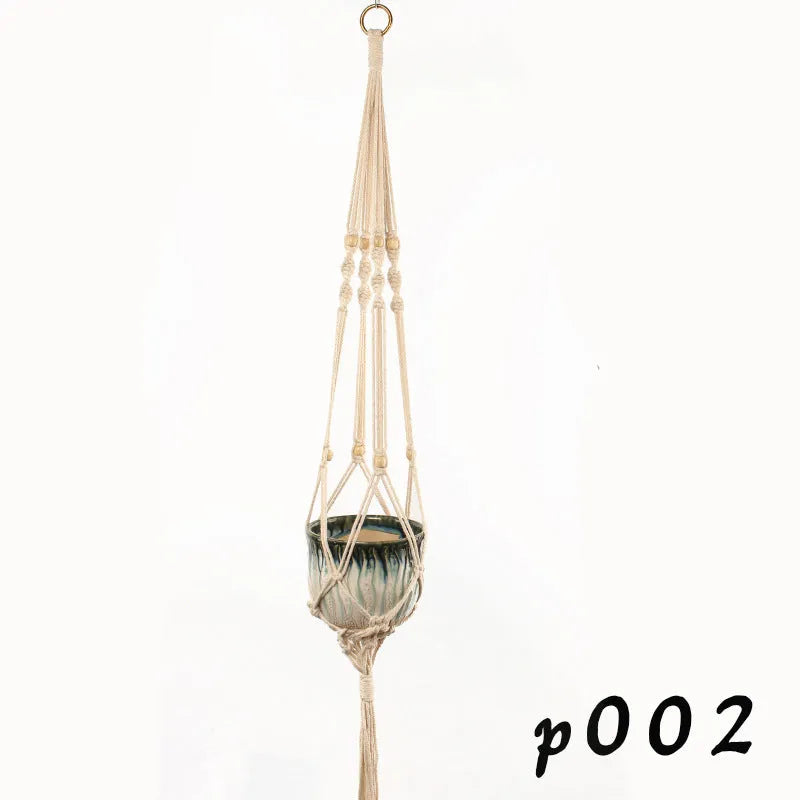 Woven cotton rope plant holder in a rustic style for hanging or tabletop use.