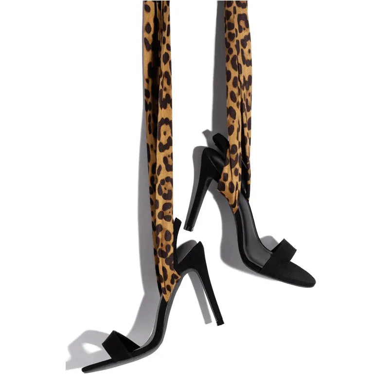 Light brown women's high heel sandals with leopard print and criss-cross ankle straps.