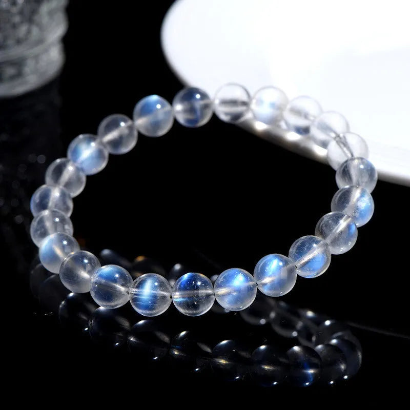 Natural cream body blue moonlight crystal bracelet showing grinding treatment details