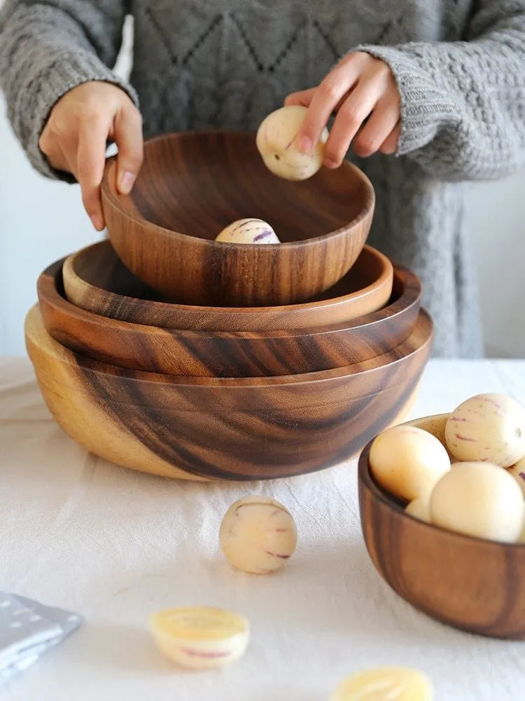 Natural brown wooden bowl with wood grain, overglaze finish, 12x6cm, on a table