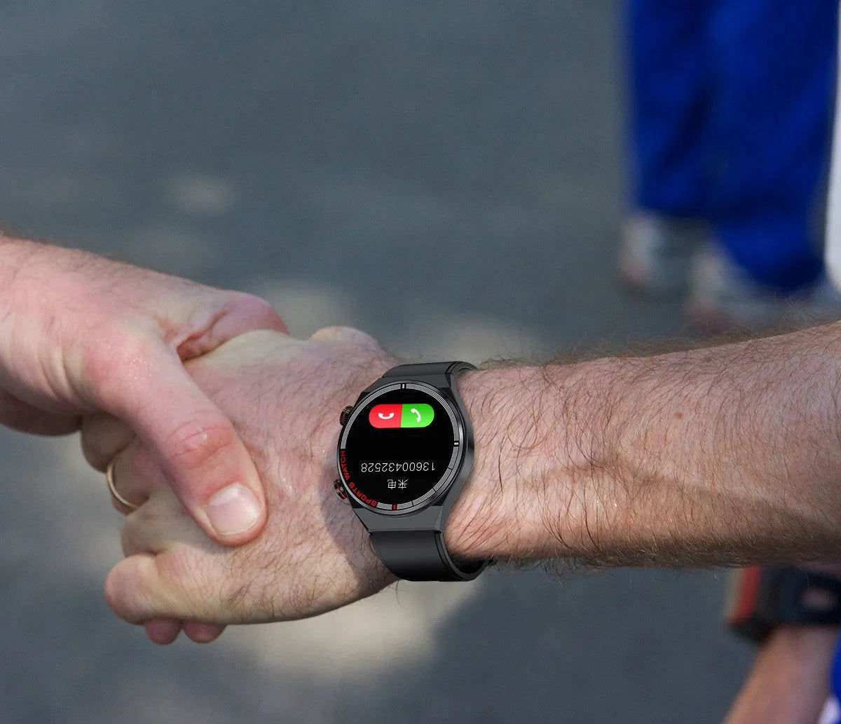 Black rotary key Bluetooth smart watch with brown genuine leather strap on a wrist.