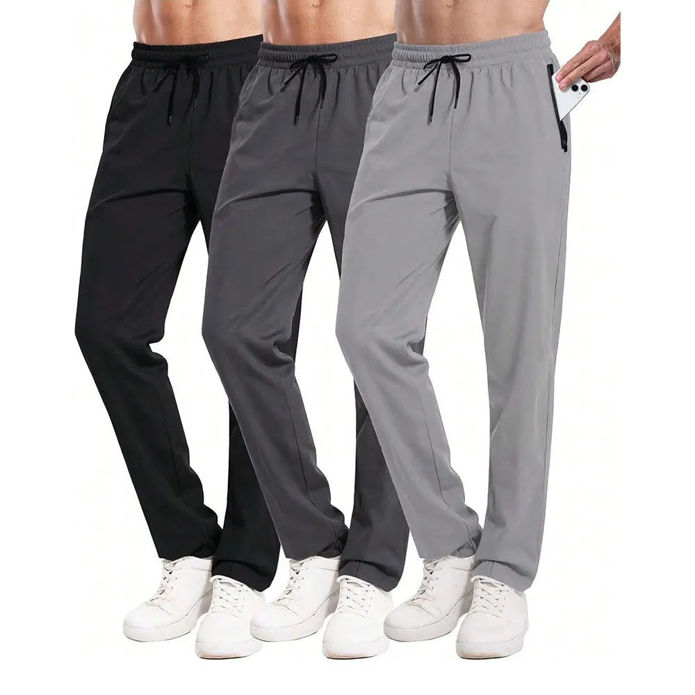Men's loose lace-up elastic waist casual pants in polyester, available in multiple colours including black and blue