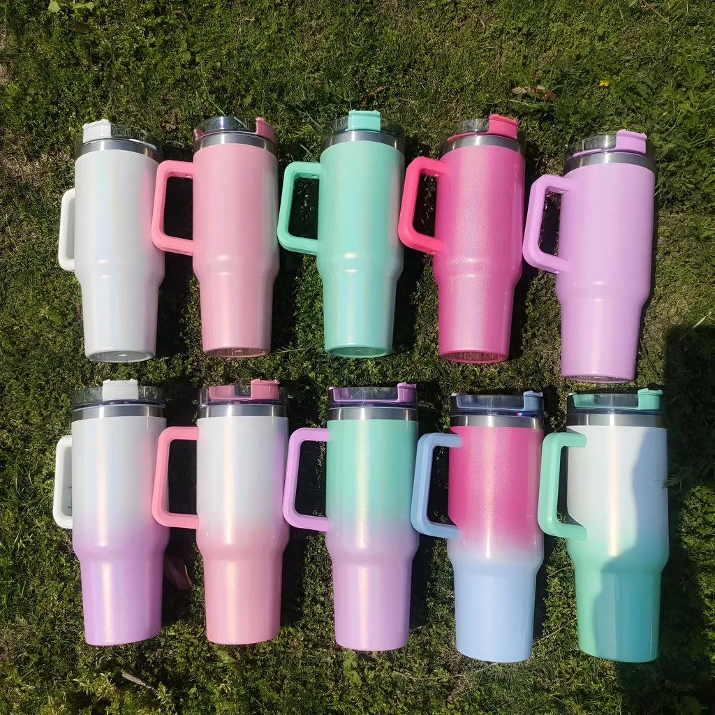 Large stainless steel vacuum cup in a rainbow colour gradient showing its size and lid.