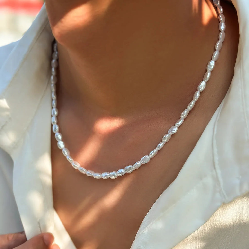 Men's white U-shaped Mother Pearl necklace on imitation pearl chain, adjustable 41-50cm length.