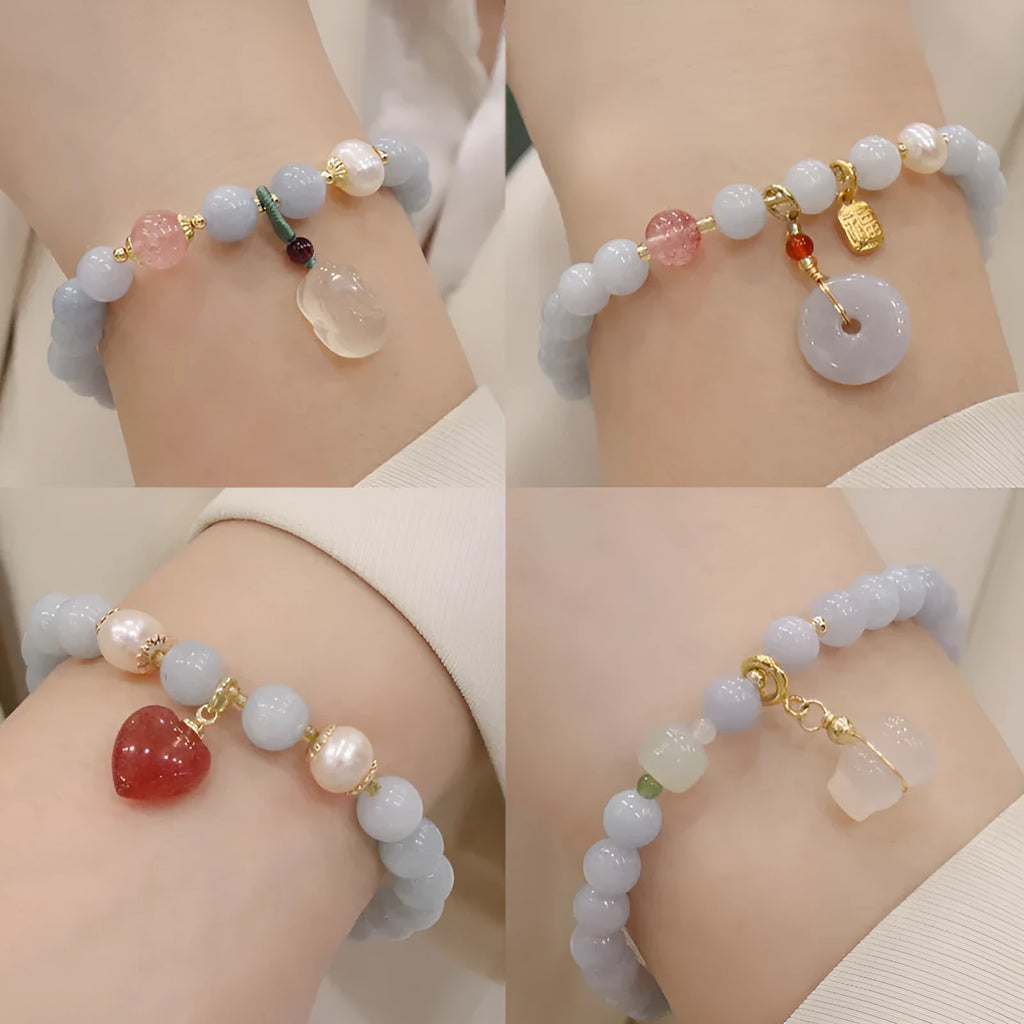 Aquamarine crystal bracelet with gold-plated climbing cat charm for women
