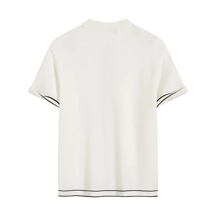 White short sleeve cardigan with dark contrast lapels on a model