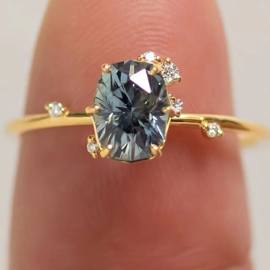 Gold plated women's ring with green zircon stones in flower design, available sizes 6-10