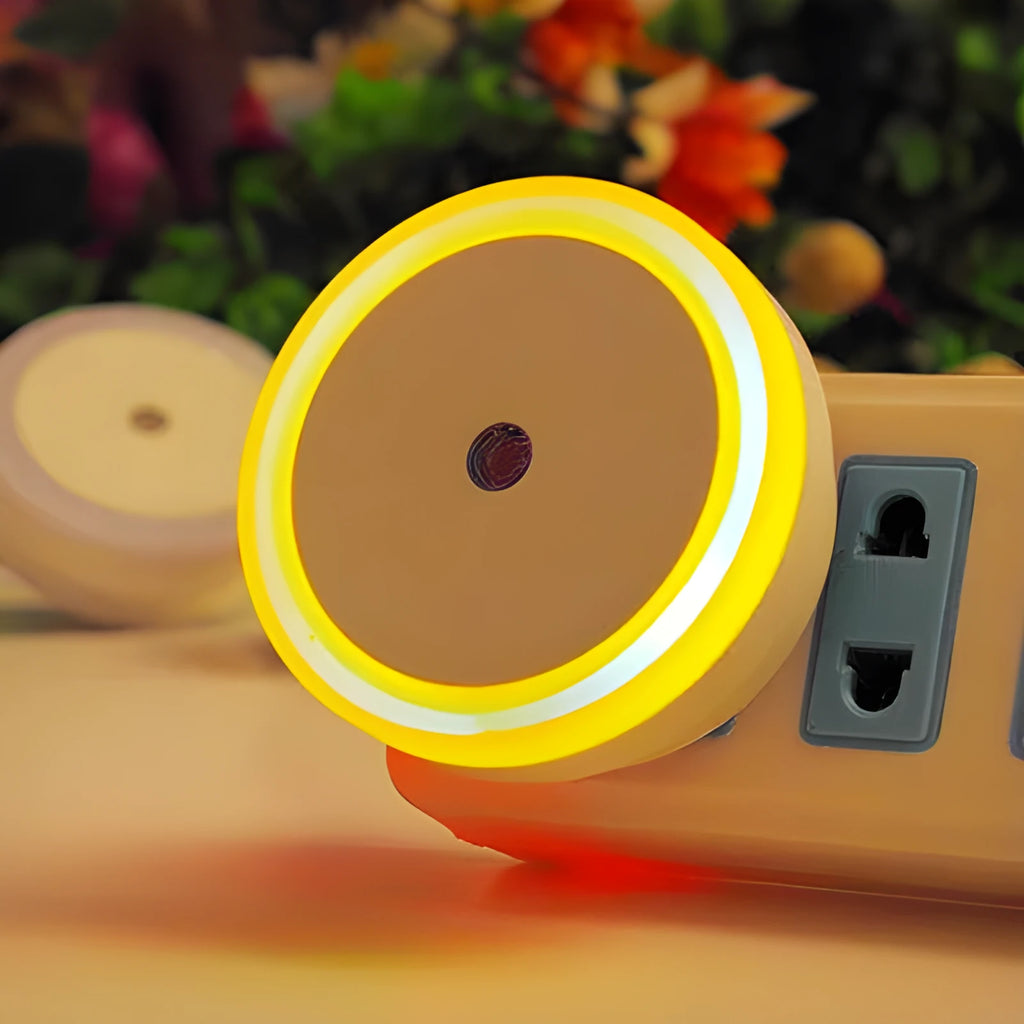 Round LED induction nightlight with halo design, shown in blue, red, white, and yellow colour options