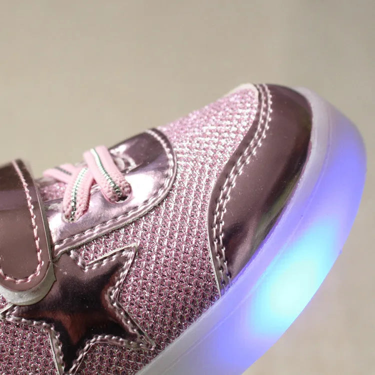 Children's LED trainers with magic button and illuminated soles in golden, pink or silvery colours