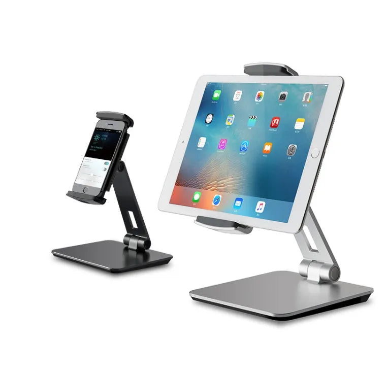 Silver foldable tablet stand showing 360-degree rotation mechanism with silicone anti-slip pads