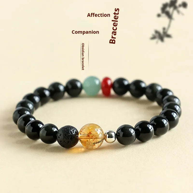 Chinese style obsidian and agate jade couple bracelet with yellow tower crystal beads.