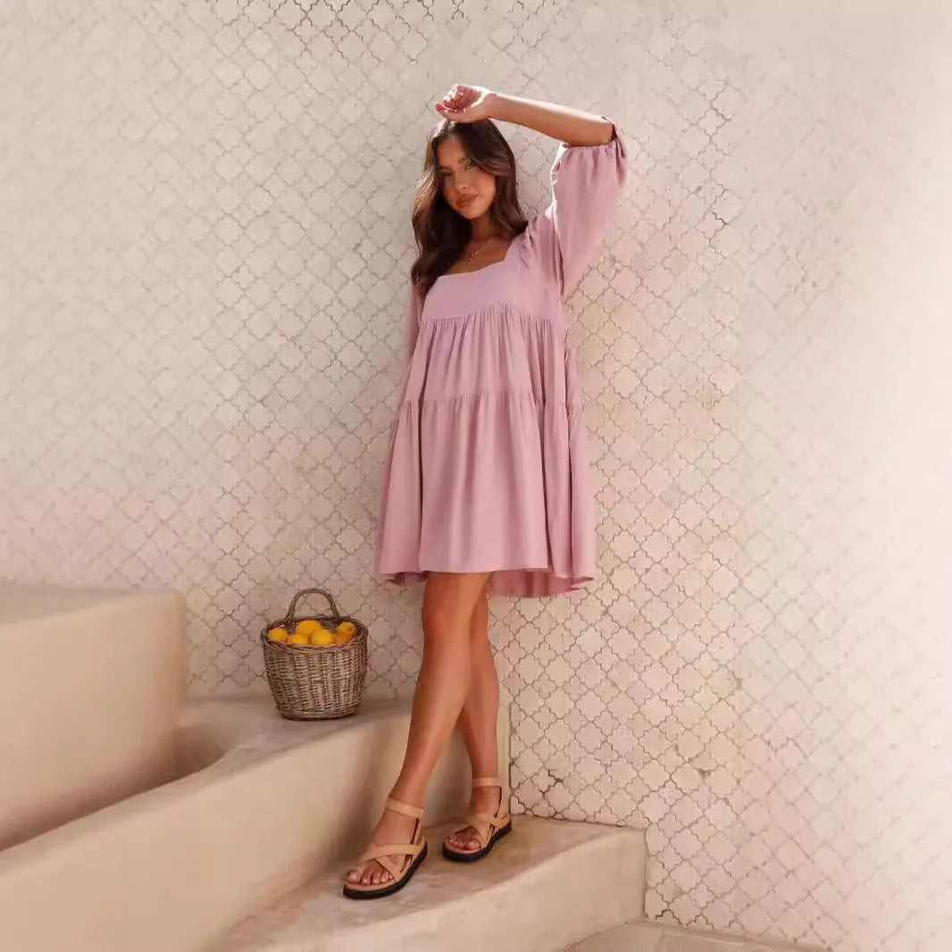 Children's solid colour pullover dress with square collar, puff sleeves, backless design, and A-line skirt.