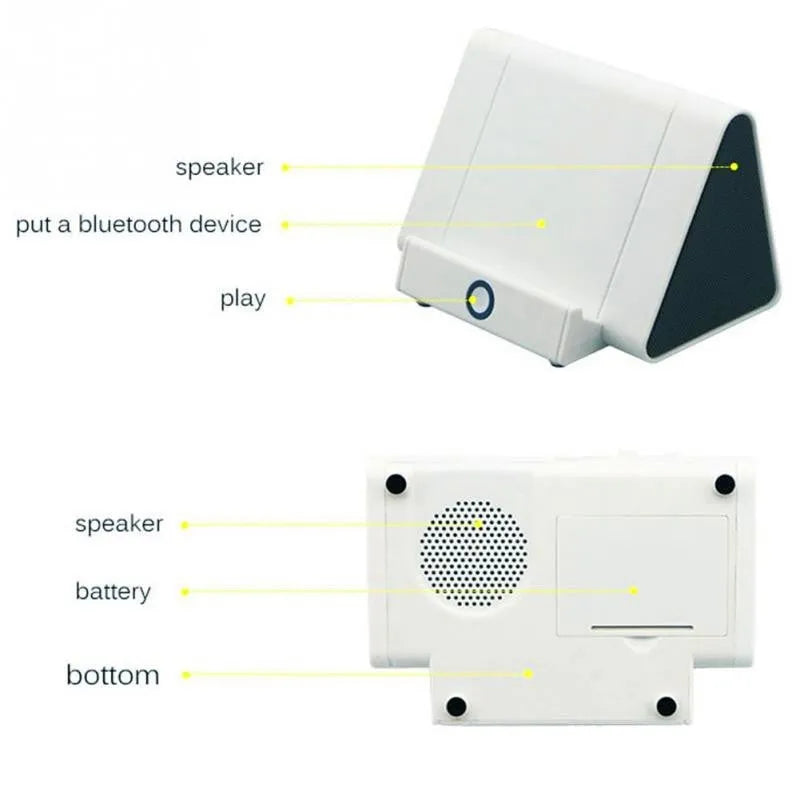 Black and white mini portable wireless Bluetooth speaker with charging cable