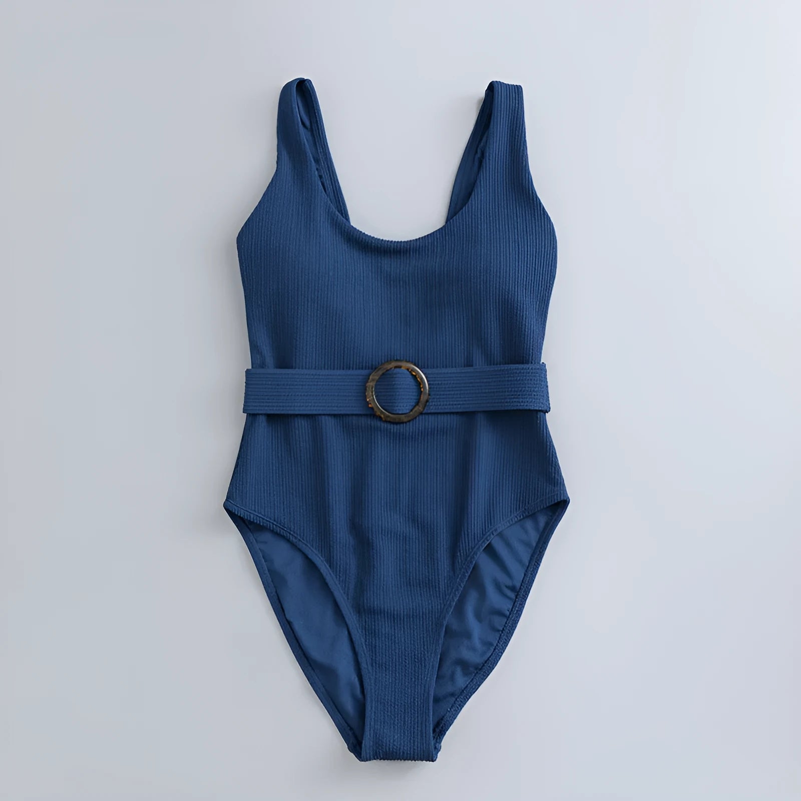 Navy blue women's slim-fit one-piece swimsuit with triangle top and removable padding.