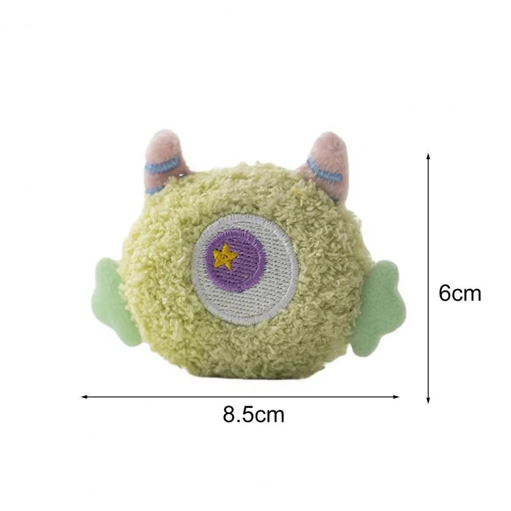 Cartoon-shaped plush dog chew toy with large eyes and squeaker in assorted colours