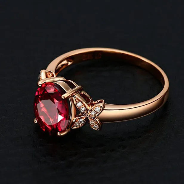 Women's copper butterfly ring with heart design in 18k rose gold tone, blue and red options