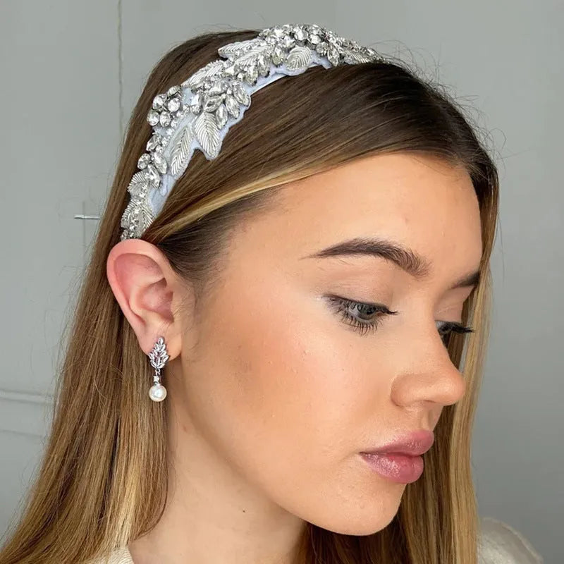 Micro inlaid zircon pearl earrings with geometric floral design in gold, platinum, or rose gold plating.