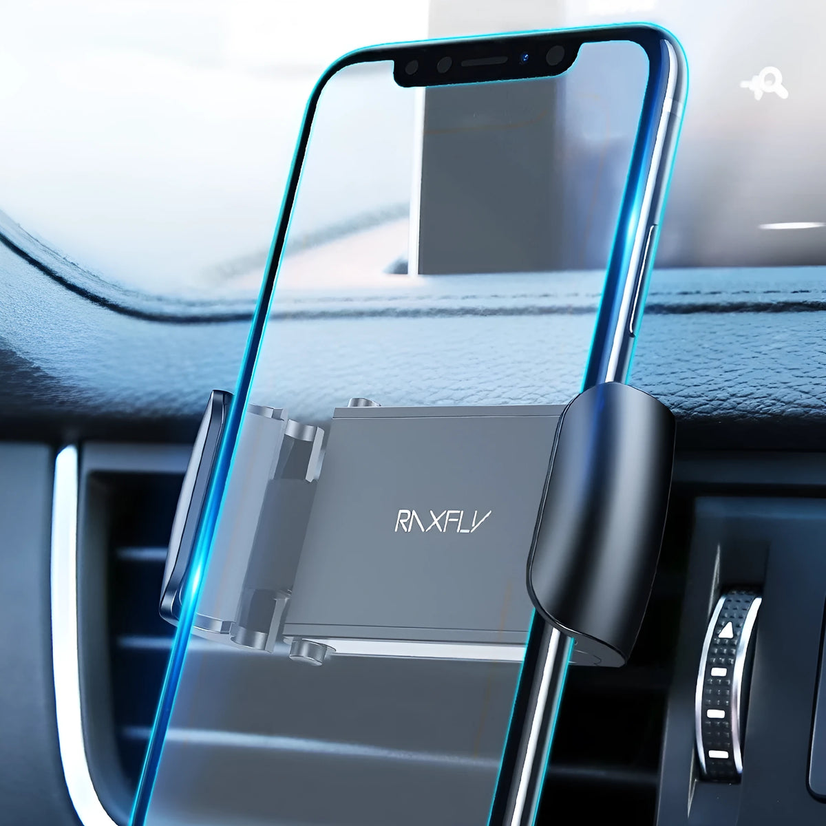 Black universal adjustable car air vent bracket phone holder made from ABS plastic clipped onto a car vent