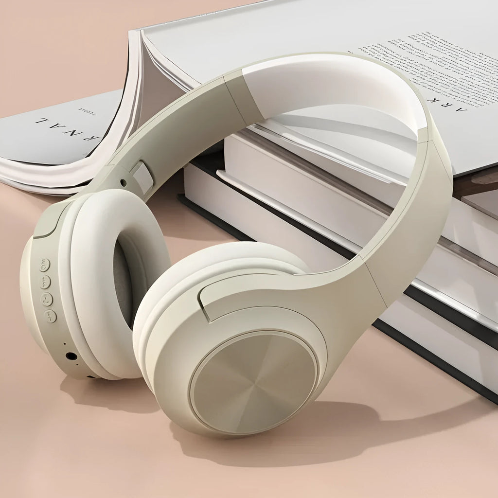 Creative design wireless Bluetooth headset shown in Ivory White, Chalk Black and Youth Green colour options.