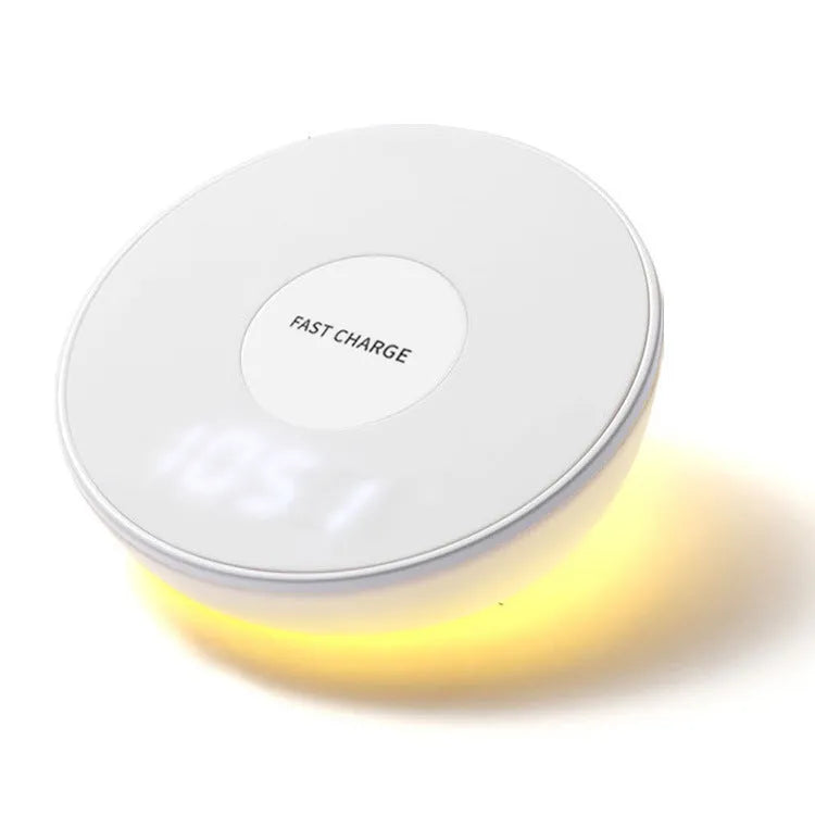 White wireless charging pad with digital clock display and control buttons for smartphone charging