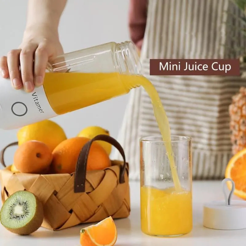 White portable USB rechargeable blender bottle with silicone carry ring, 350ml Tritan cup, and stainless steel blades.