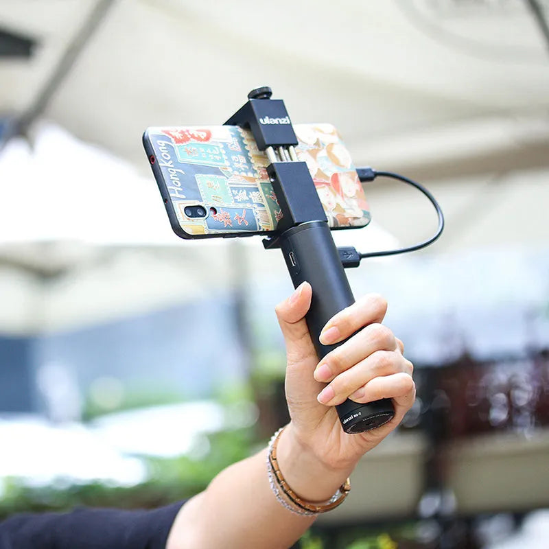 Black aluminium alloy portable power bank charging handle with integrated carry handle.