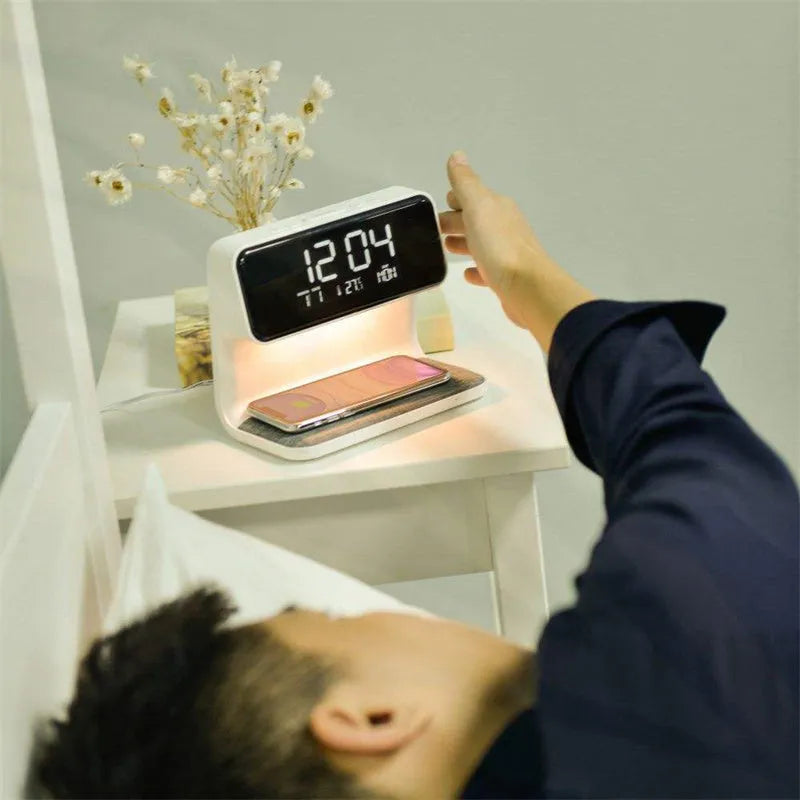 White 3-in-1 bedside lamp with wireless charging pad, LCD clock screen, and touch dimming controls