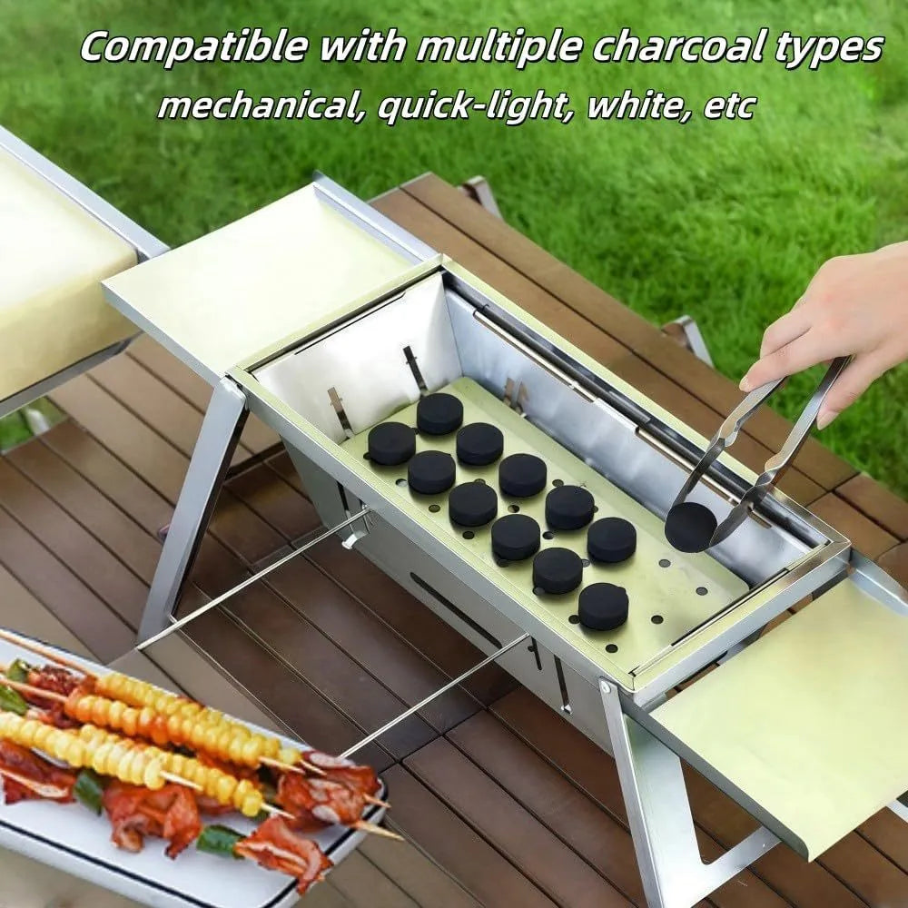 Small foldable metal charcoal grill with a carrying handle, shown in a compact stored position.