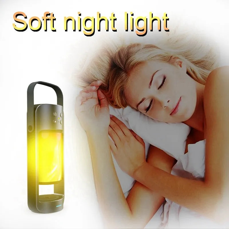 Portable Bluetooth speaker with yellow dancing flame light effect showing wireless charging surface