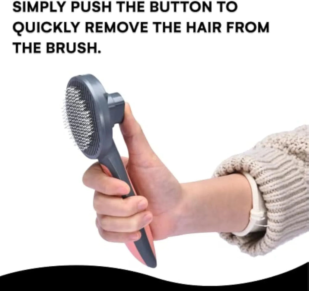 Grey self-cleaning slicker brush for cats and dogs with massaging bristle tips on a non-slip handle.
