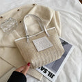 White straw woven women's shoulder bag with three-dimensional pockets showing European retro styling details