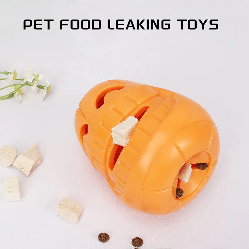 Orange Halloween pumpkin shaped dog chew toy with a treat-dispensing funnel hole