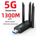 Black USB network transmitter with four adjustable antennas for computer wireless signal enhancement