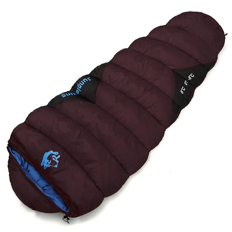 Outdoor cotton sleeping bag in army green with its compression storage sack.
