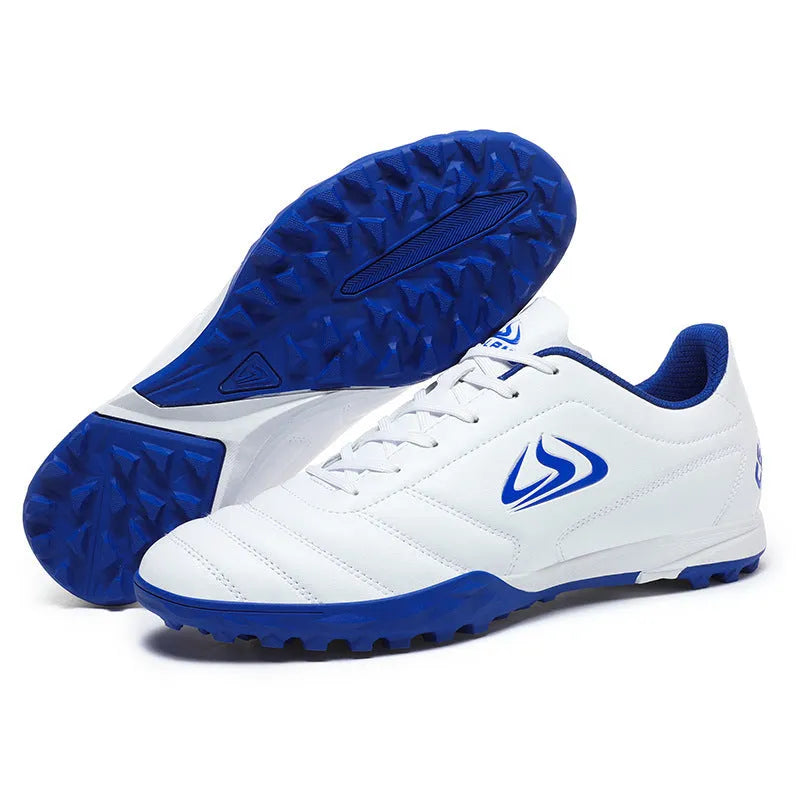 Low-top outdoor soccer shoes in a broken nail colour pattern with a rubber sole and lace-up front.