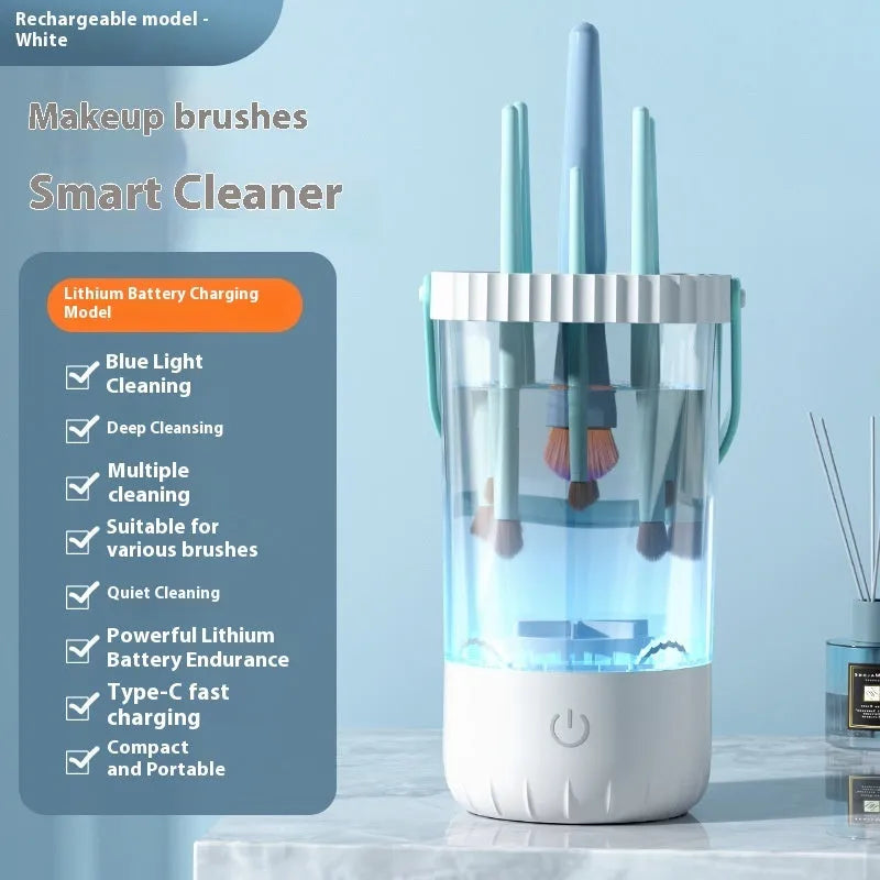 White rechargeable electric cleaning brush for makeup brushes with USB cable.