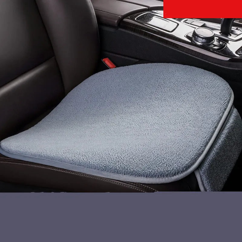 Fleece plush winter car seat cushion without backrest in black colour on a grey car seat