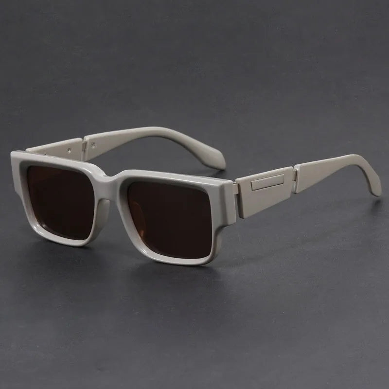 Blue frame sunglasses with grey-blue lenses and thick square retro design
