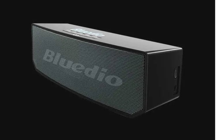 Black BS-6 cloud smart speaker showing compact design with Bluetooth connectivity.