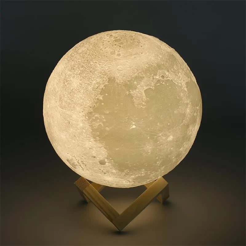 3D printed spherical moon lamp showing lunar surface texture on wooden holder