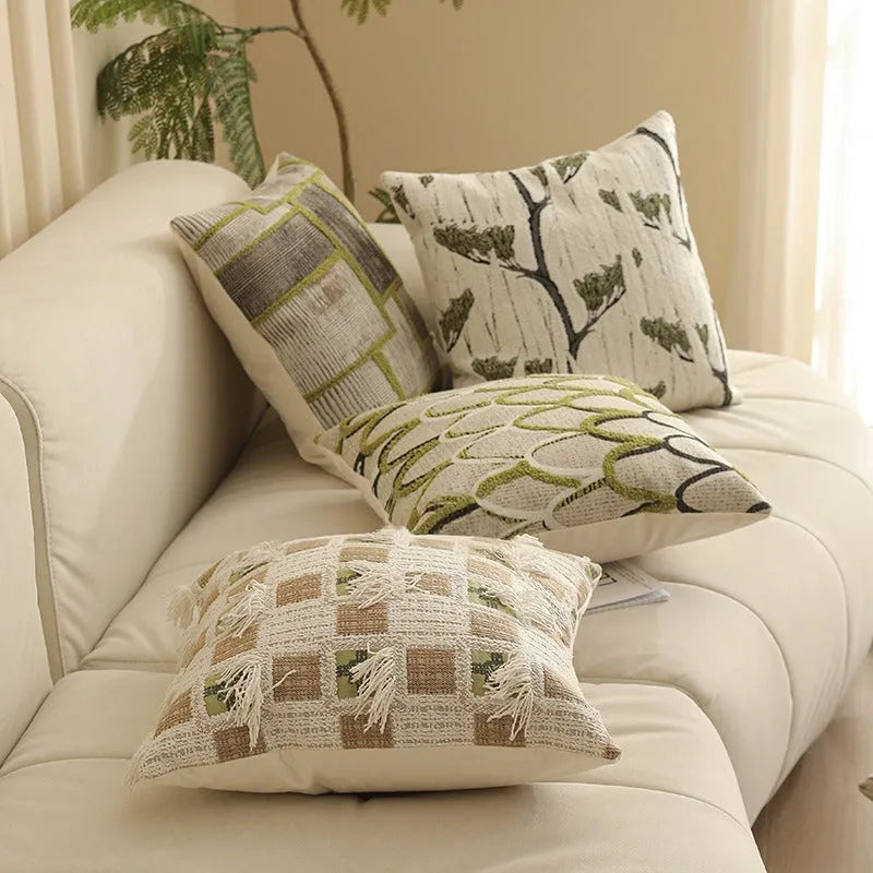 Close-up of a 45cm square jacquard cushion cover with a woven floral pattern in retro Nordic style.