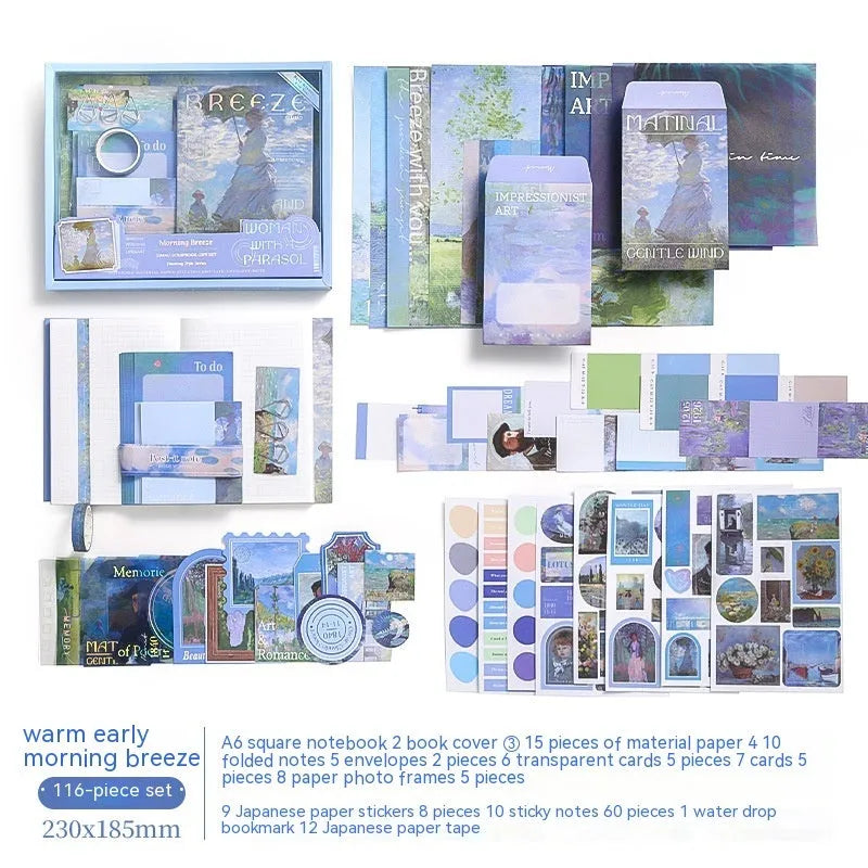 A6 creative journal gift box open to show grid notebook, bookclothes cover, material paper, cards, envelopes, stickers, and a water drop bookmark.