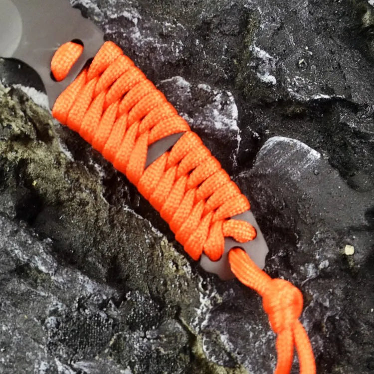 Camping survival knife with rope-wrapped handle and ABS sheath showing blade and full length