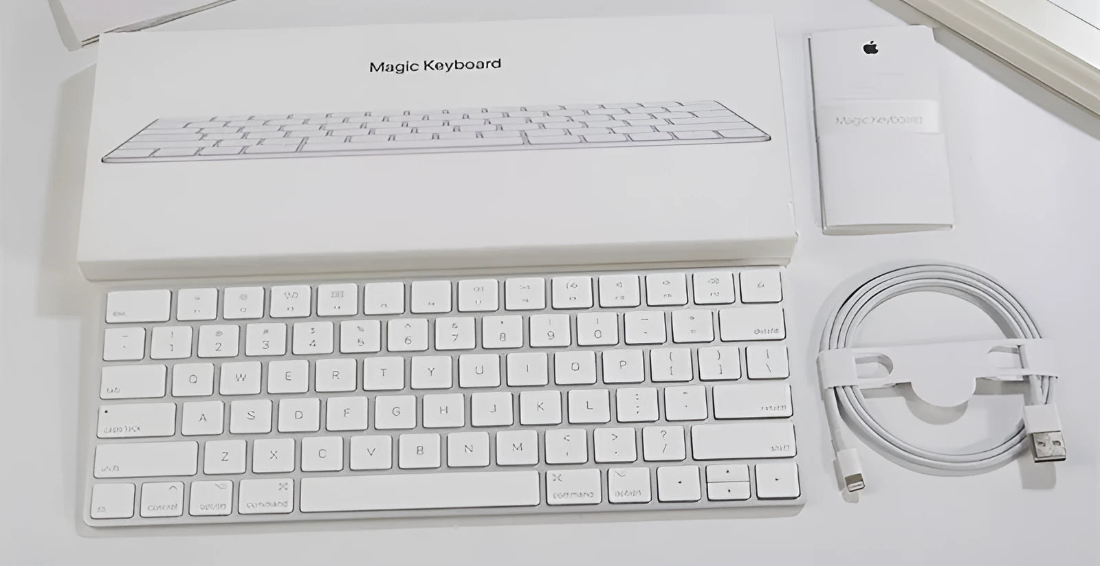 Brand new white Apple Bluetooth G6 wireless keyboard with multimedia keys in metal box.