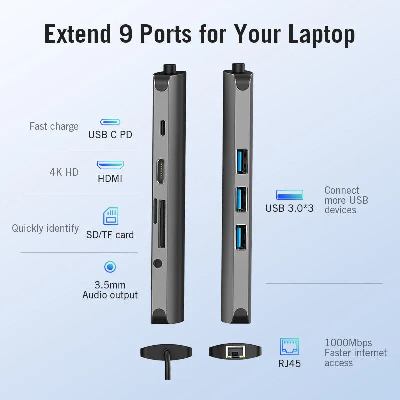 Deep grey USB-C to HDMI, USB 3.0, Ethernet, and card reader hub with a short cable on a desk.